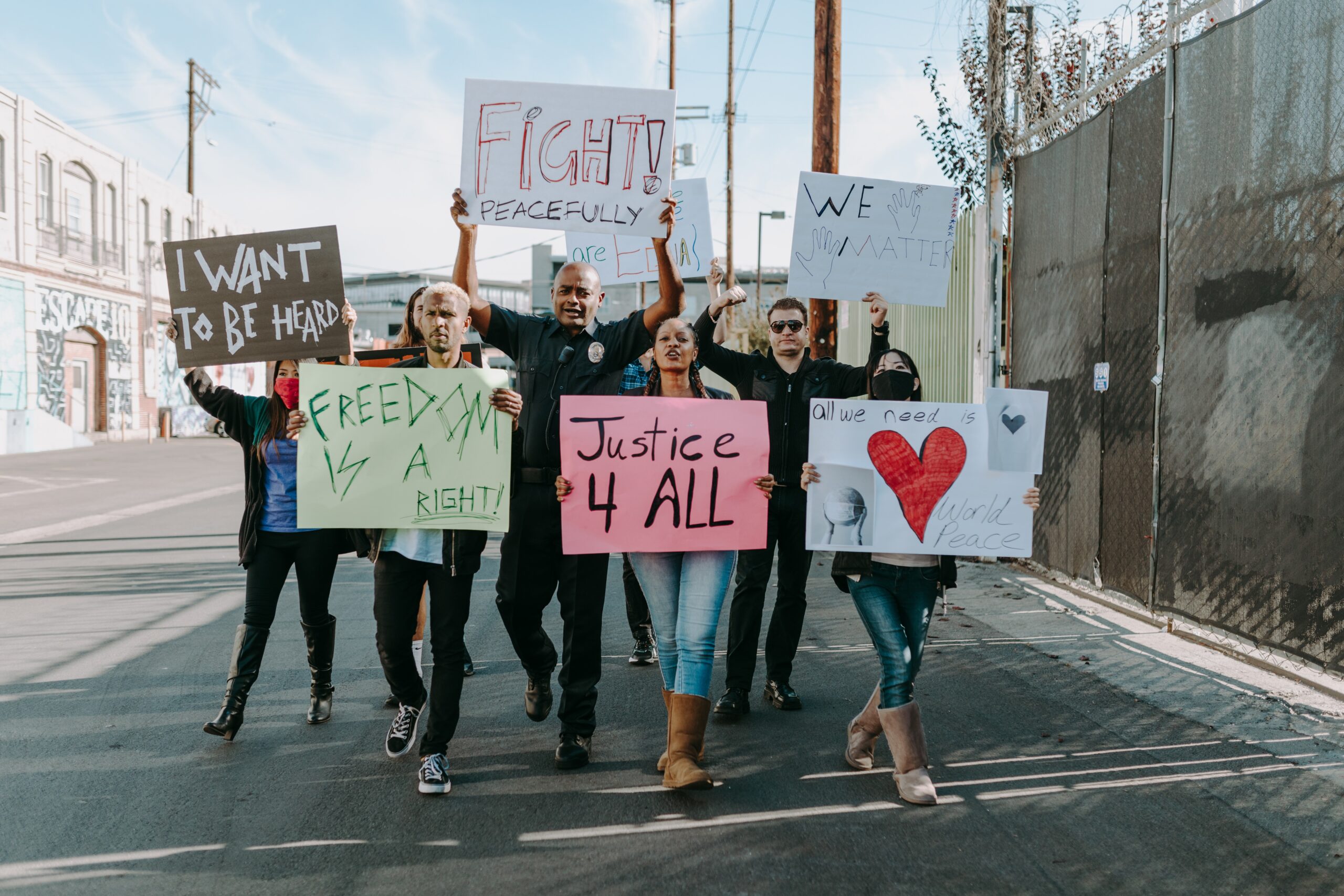 Protesters holding signs